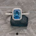 The Petite Pave Halo Ring in 14k white gold with 1.70-Carat Montana Sapphire