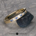 The Deluxe Channel-Set Yogo Sapphire and Diamond Band in 14k yellow gold