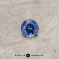 A color-change Montana sapphire in a classic diamond round brilliant design