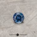 A color-change Montana sapphire in a classic diamond round brilliant design