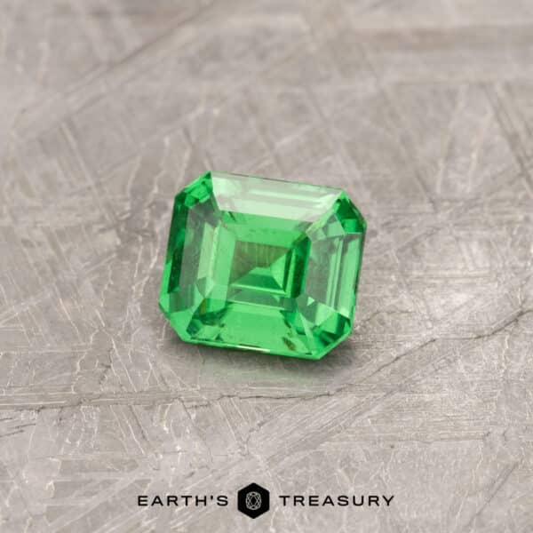 A green Tsavorite Garnet in a classic emerald cut