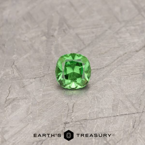 A green Tsavorite Garnet in a custom square cushion design