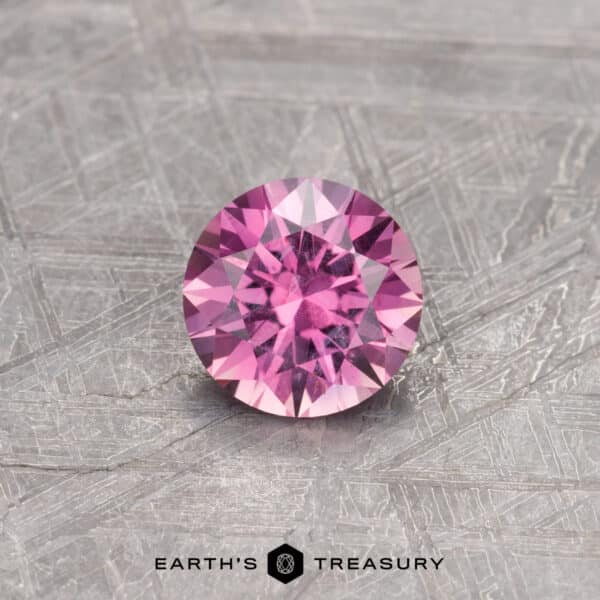 A pink Montana sapphire in a classic diamond round brilliant design