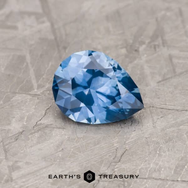 A blue Montana sapphire in our "Apios" pear-shaped design