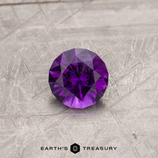 A purple Arizona amethyst in a custom round design