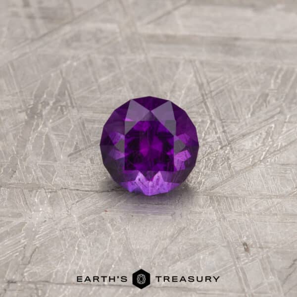 A purple Arizona amethyst in a custom round design