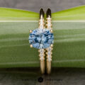 The "Paloma" ring in 14k yellow gold with 1.85-carat Montana sapphire, alongside the Paloma band in 14k yellow gold