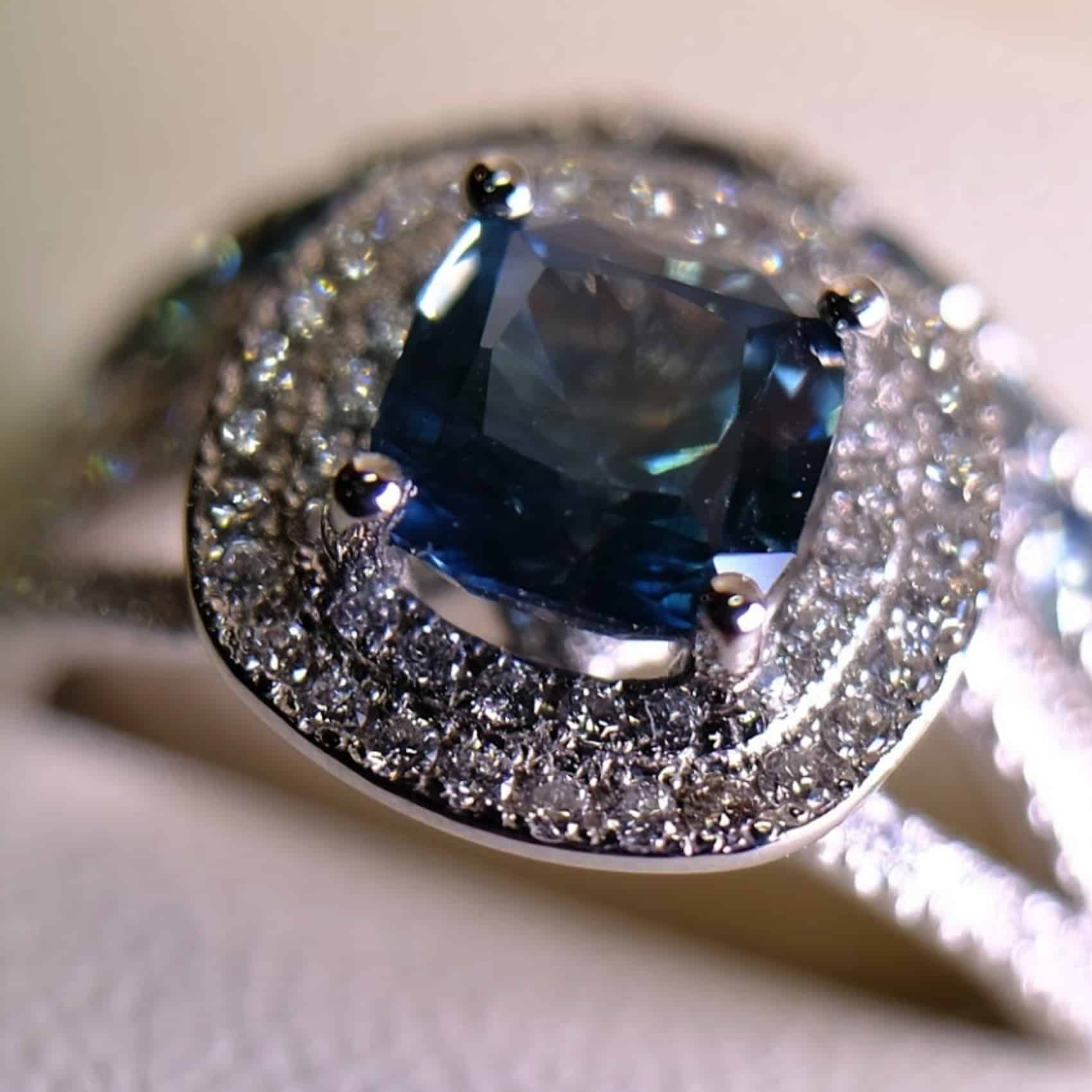 A photo from a customer review featuring a custom halo ring in platinum with a 1.98-carat Montana sapphire