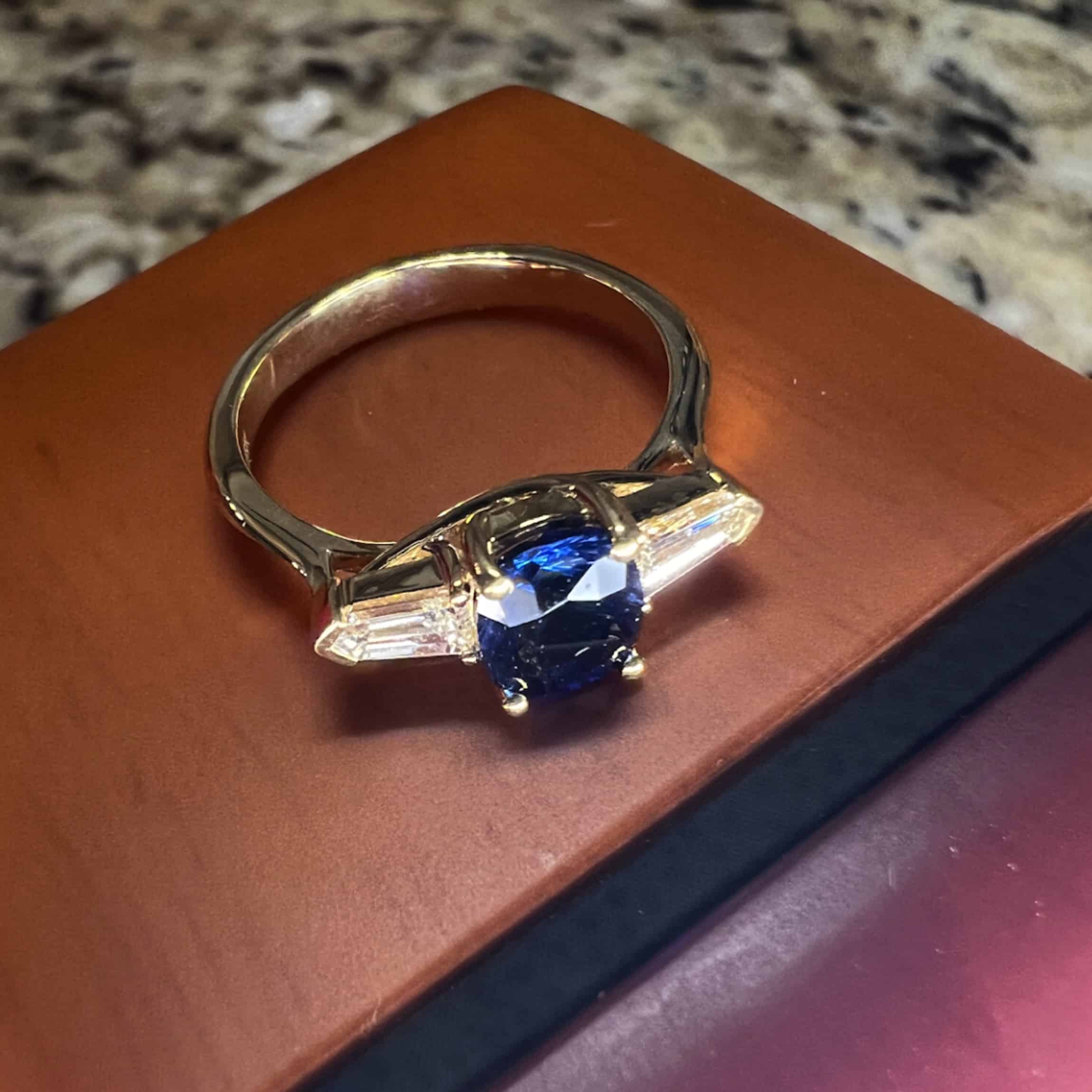 A photo from a customer review featuring The "Mandevilla" ring in 18k yellow gold with 1.21-Carat Ceylon Sapphire